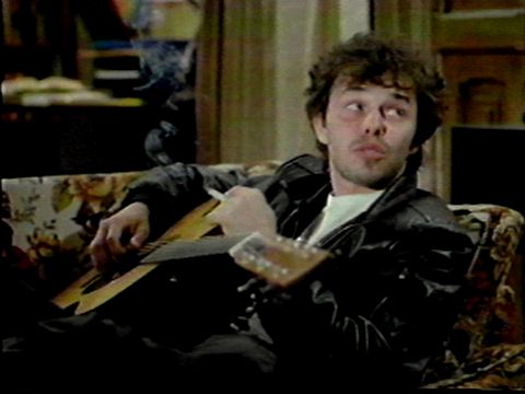 Name:  Booger_on_guitar.jpg
Views: 351
Size:  23.3 KB