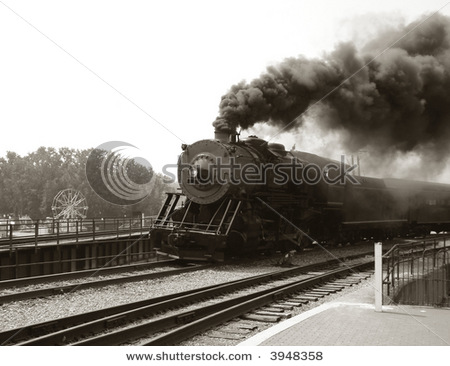 Name:  stock-photo-vintage-steam-engine-locomotive-speeding-on-railroad-tracks-curve-and-blowing-heavy-.jpg
Views: 249
Size:  52.3 KB