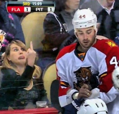 Name:  Female-penguins-fan-flipping-the-bird-418x400.jpg
Views: 2211
Size:  48.8 KB