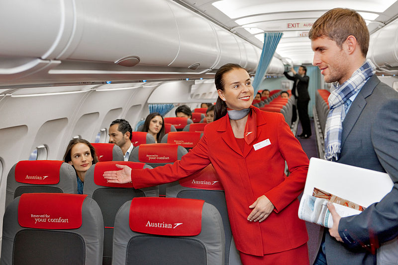 Name:  Austrian_Airlines_flight_attendant_and_passenger.jpg
Views: 354
Size:  91.2 KB