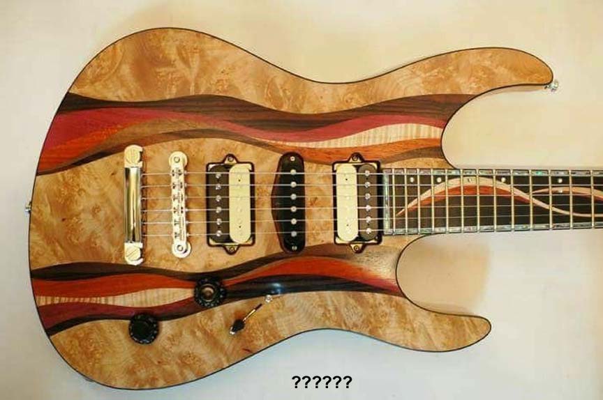 Name:  guitarunknown.jpg
Views: 695
Size:  63.2 KB